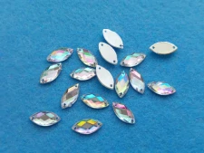 Našívací broušené korálky 15 x 7 mm - transp. s AB efektem